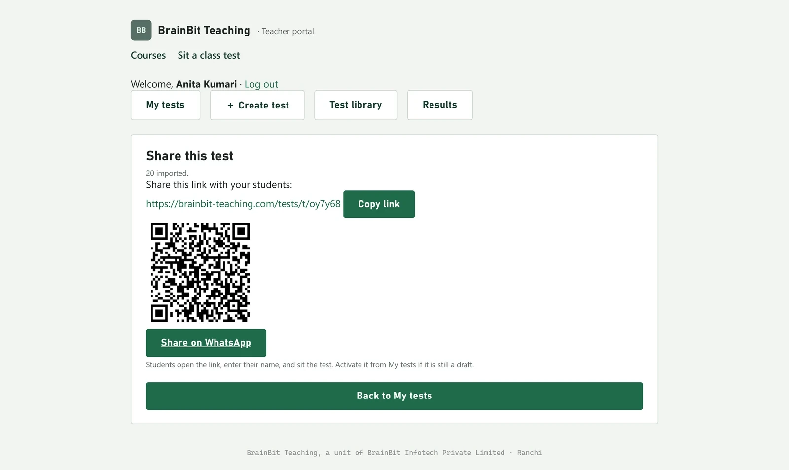 The share screen with the test link, a Copy link button, a QR code and a Share on WhatsApp button.
